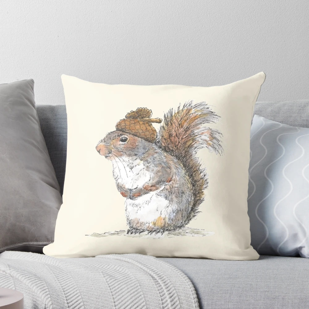 Illustration of a cute, whimsical squirrel wearing an acorn-shaped hat on a decorative pillow.