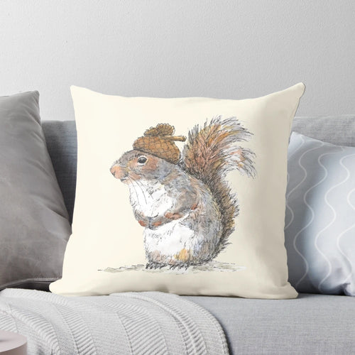 Illustration of a cute, whimsical squirrel wearing an acorn-shaped hat on a decorative pillow.