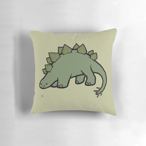 Image of a green stegosaurus-shaped plush pillow with a cute, chibi-style design