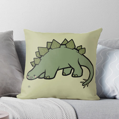 Image of a green stegosaurus-shaped plush pillow with a cute, chibi-style design