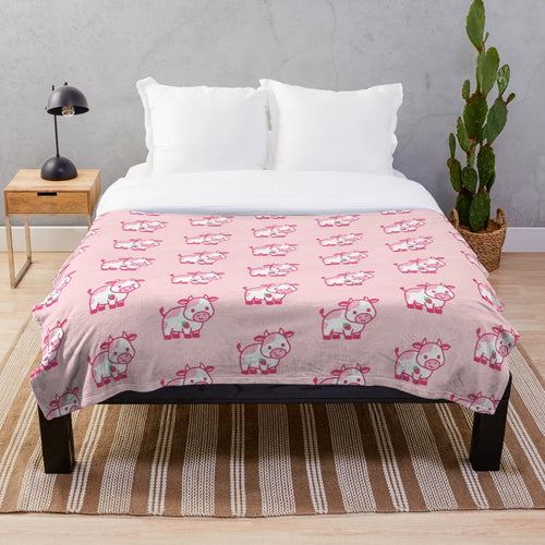 Soft and snuggly strawberry cow plush blanket