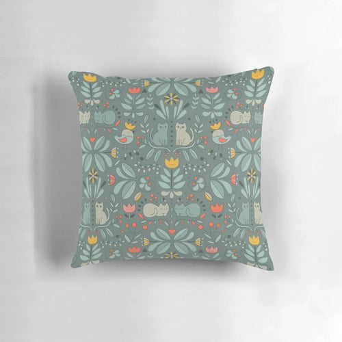 Whimsical illustration of colorful, cartoon-style Swedish folk cats on a decorative pillow.