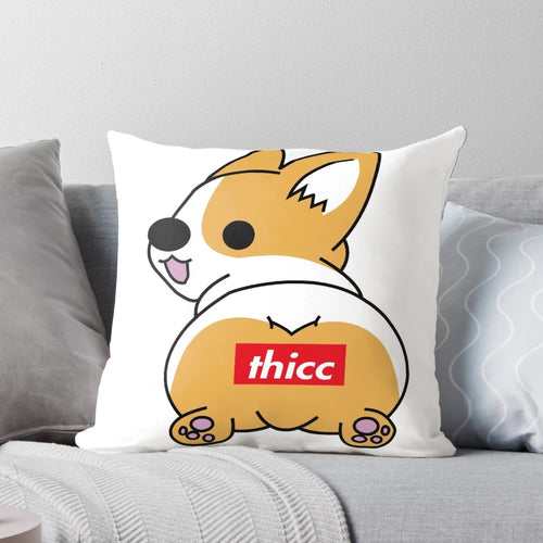 A plush and soft pillow designed in the shape of a chunky corgi's backside.
