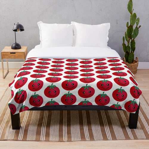 Tomato plush blanket with a cute smiling design