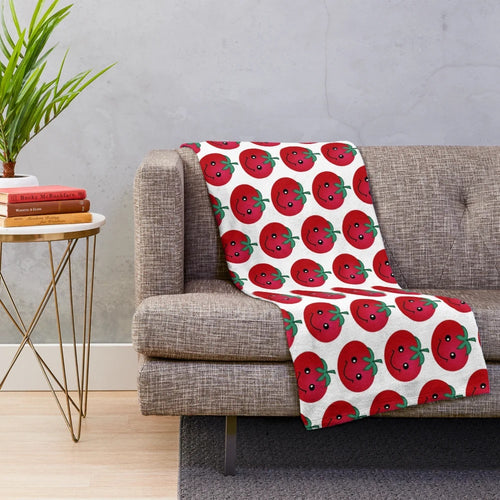 Tomato plush blanket with a cute smiling design