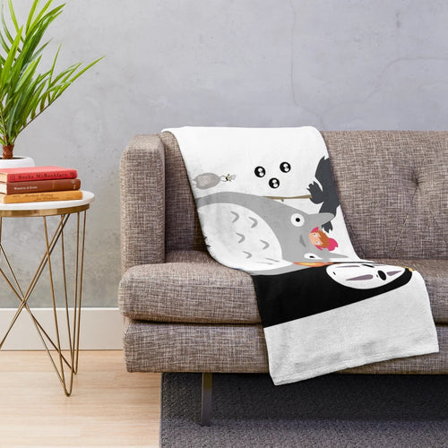 Soft and cuddly plush blanket featuring the beloved Totoro character