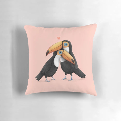 Soft, pink toucan plush pillow with two toucans hugging and cuddling