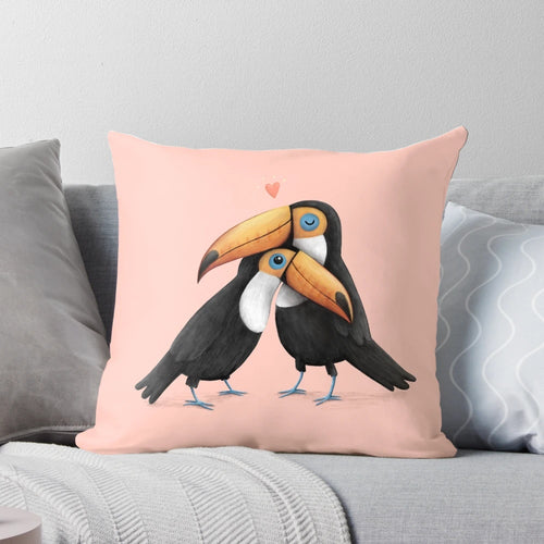 Soft, pink toucan plush pillow with two toucans hugging and cuddling