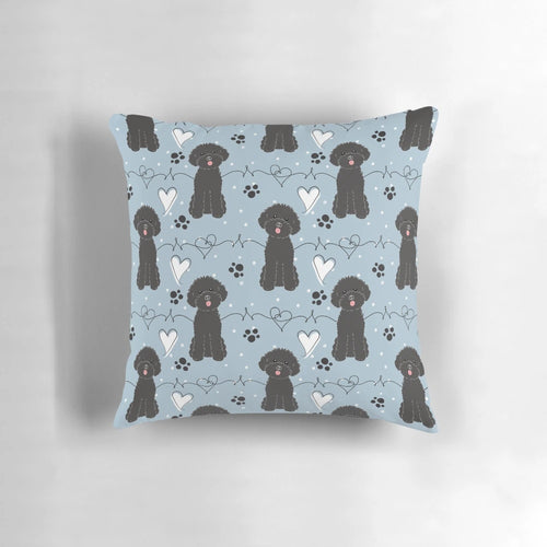 Soft, cuddly toy poodle pillow featuring a black poodle with a loving expression.