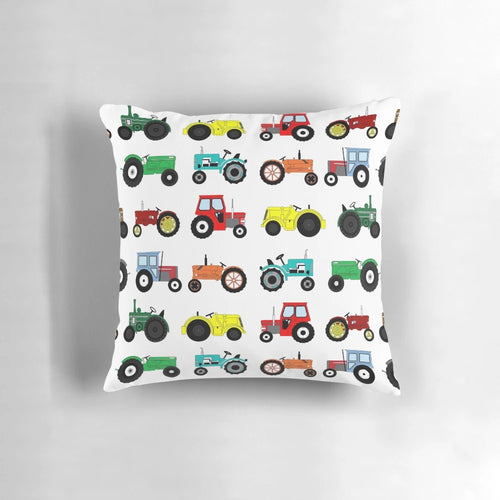 Colorful tractor print pillow with farm animals and vehicles