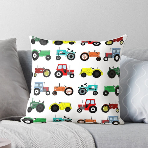 Colorful tractor print pillow with farm animals and vehicles