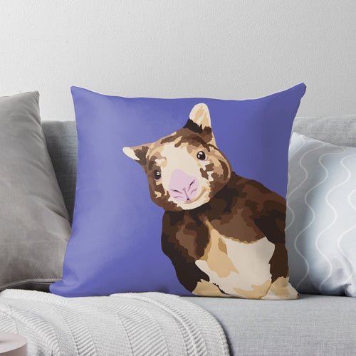 Vibrant portrait of a tree kangaroo printed on a soft, cozy pillow