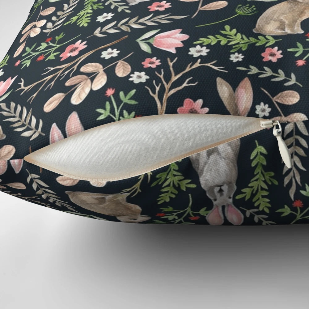 Beautifully designed pillow featuring a whimsical watercolor illustration of a cute blue rabbit surrounded by floral and nature elements.