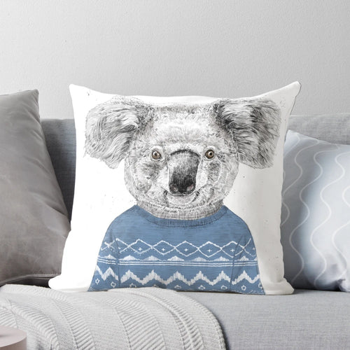 Soft and cuddly winter koala plush pillow with festive holiday design