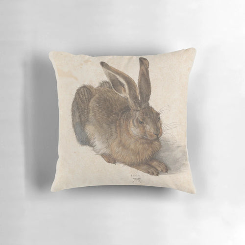 Soft, plush pillow featuring the famous "Young Hare" painting by Albrecht Dürer