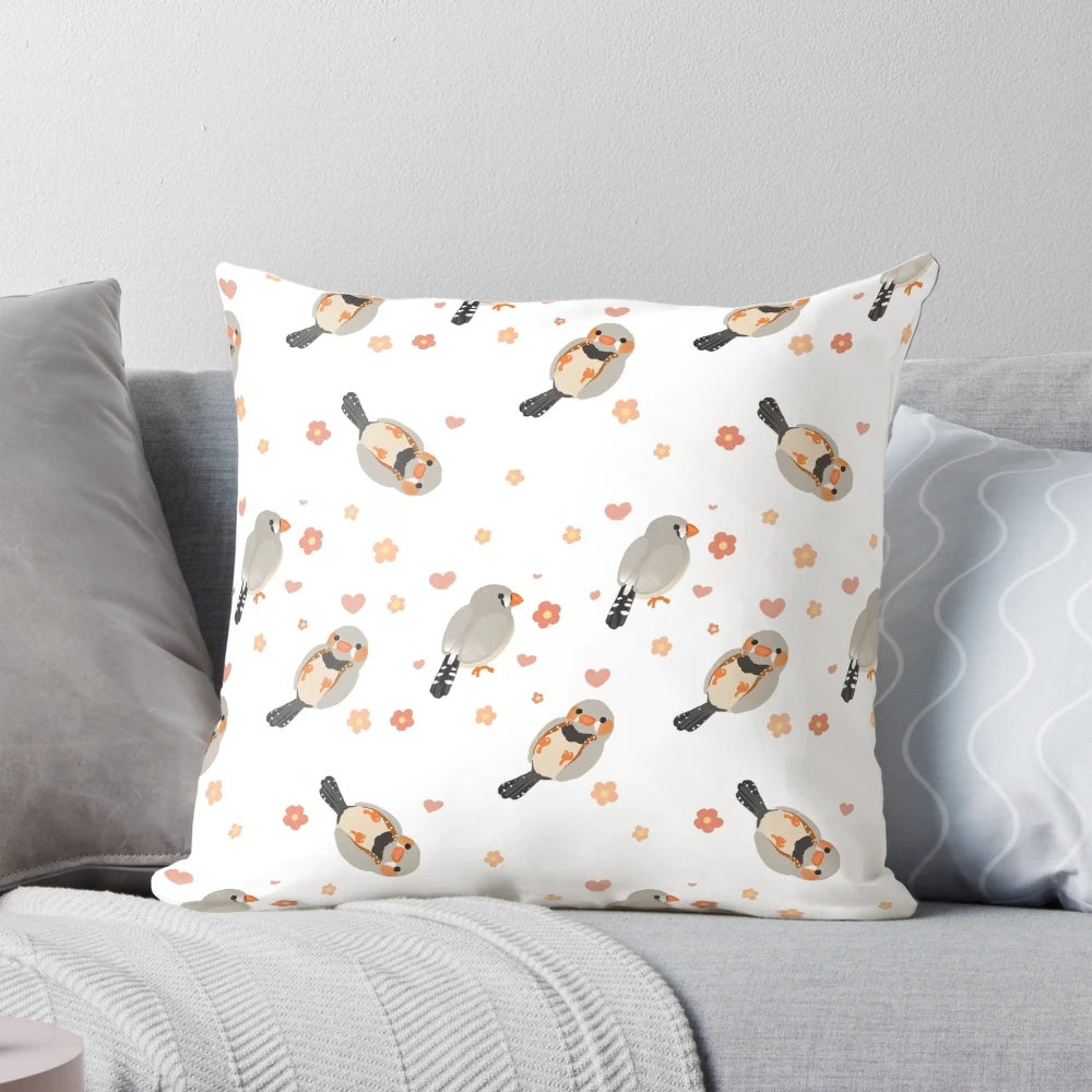 Pillow featuring a colorful pattern of zebra finches and flowers