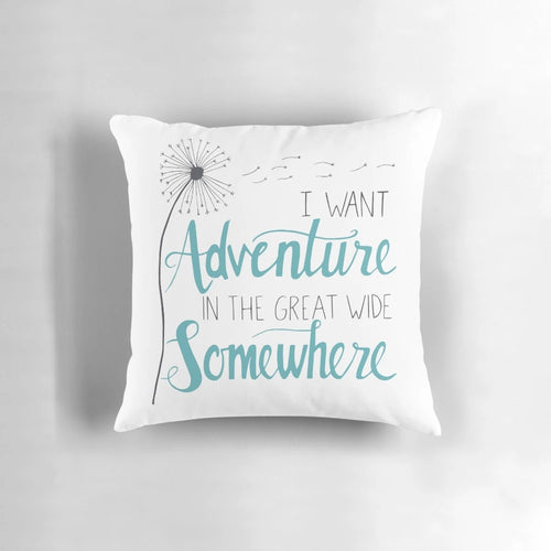 Decorative adventure-themed pillow with hand-lettered inspirational quote