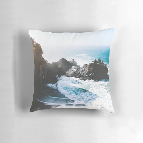 Outdoor pillow with a stunning waterfall and coastal design