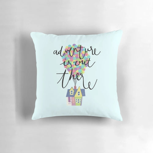 Colorful decorative pillow featuring hand-lettered "Adventure is out there" design inspired by the Disney Pixar movie Up.