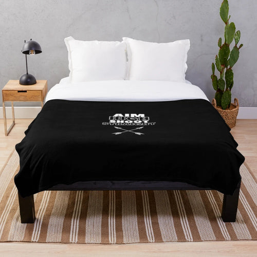 Archery-themed plush blanket with arrows and bullseye design