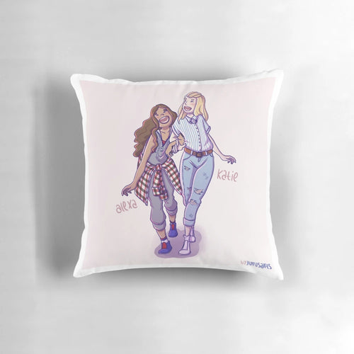 Alexa and Katie best friends pillow featuring a comic art design of the two girls in a supportive friendship.