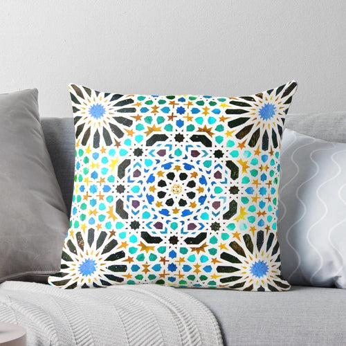 Alhambra-inspired geometric mosaic pattern on a decorative pillow
