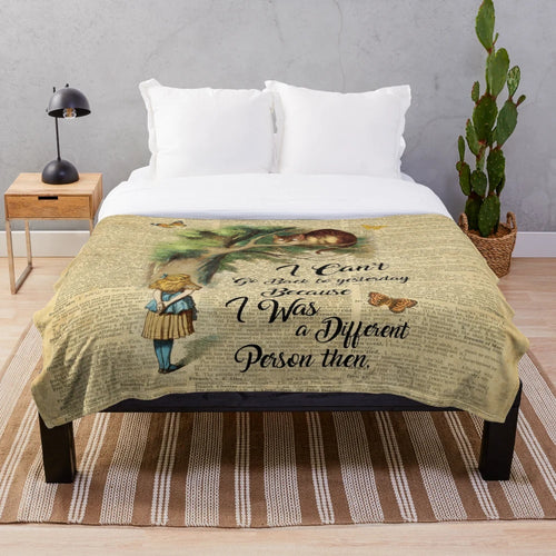 Vintage dictionary art plush blanket featuring the Cheshire Cat from Alice in Wonderland