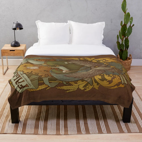 A plush blanket featuring an allegory design with an art nouveau-inspired Norse falcon motif