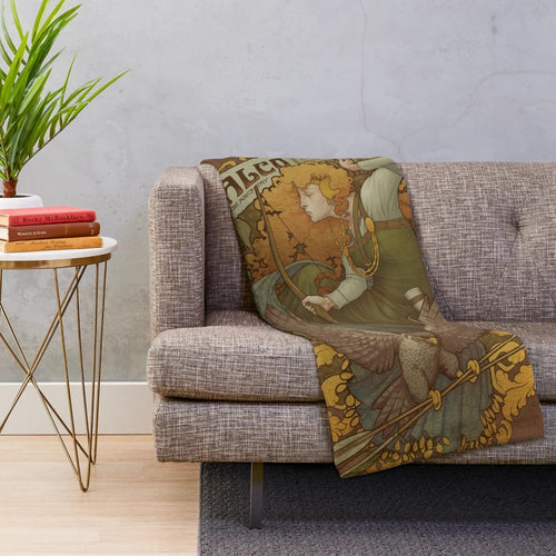 A plush blanket featuring an allegory design with an art nouveau-inspired Norse falcon motif
