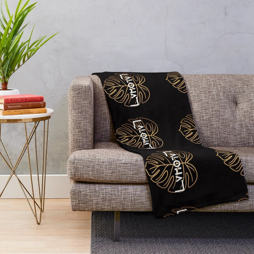 Aloha Gold Plush Blanket with Tropical Leaf Design