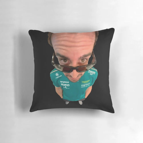 A plush pillow featuring a meme-inspired design with Fernando Alonso, the renowned Formula 1 racing driver.