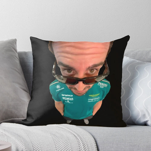 A plush pillow featuring a meme-inspired design with Fernando Alonso, the renowned Formula 1 racing driver.