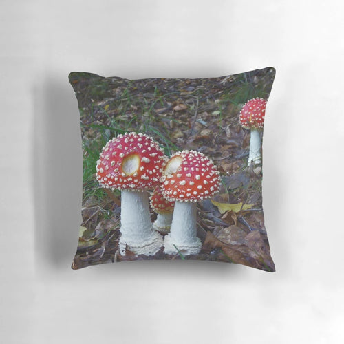 Amanita Muscaria toadstool close-up on a soft, plush pillow