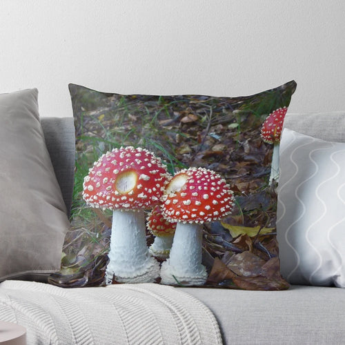 Amanita Muscaria toadstool close-up on a soft, plush pillow