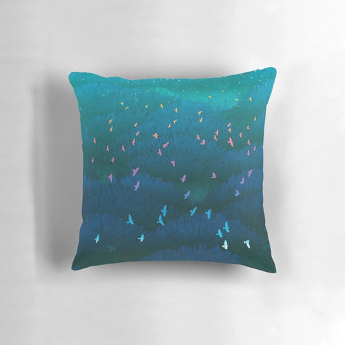 Amazonian Flight Pillow featuring a vibrant blue tropical landscape and wildlife