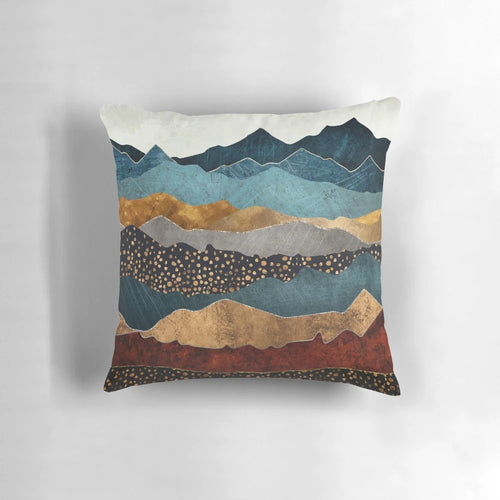 Amber Dusk Pillow featuring a scenic landscape with mountains, hills, sun, and moon