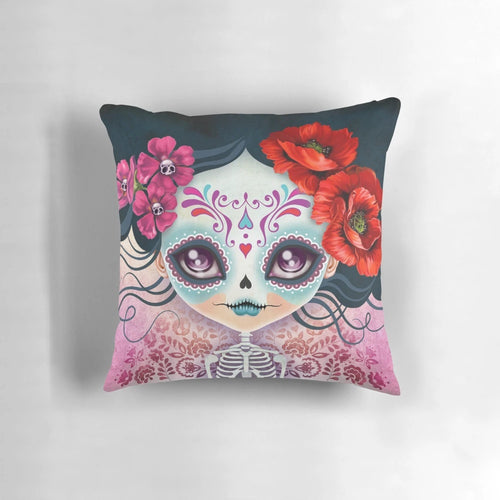 Close-up image of a decorative sugar skull pillow with intricate Mexican folk art design.