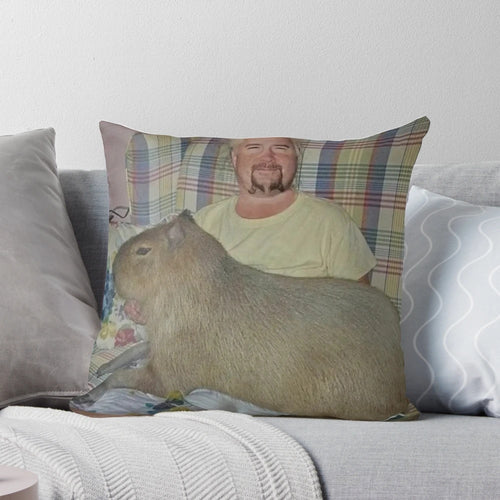 Funny and unusual image of Guy Fieri posing with a capybara, printed on a high-quality pillow