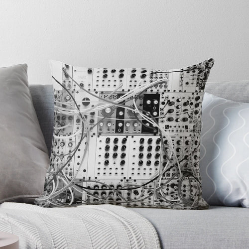 Stylish black and white pillow featuring an analog synthesizer with a modular design, perfect for music studios and vintage technology enthusiasts.