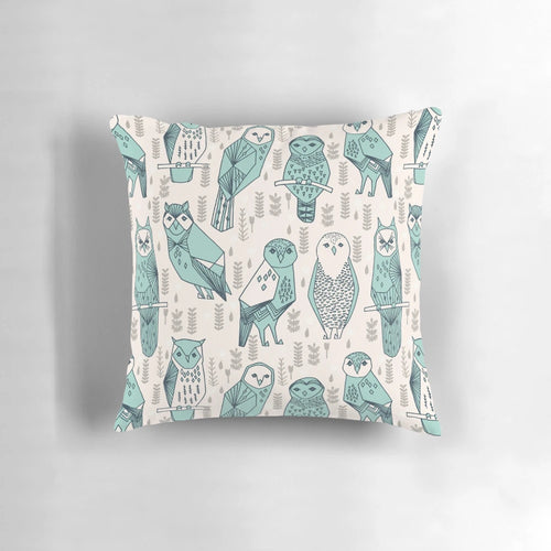 Turquoise and white owl pattern pillow by Andrea Lauren