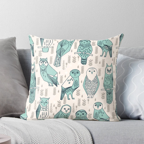 Turquoise and white owl pattern pillow by Andrea Lauren