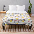 Cozy anti-war plush blanket with soothing peace symbol design