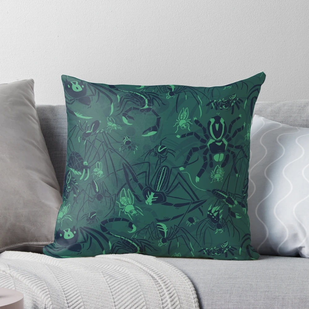 A plush, decorative pillow featuring a striking green pattern inspired by arachnids and other natural elements.