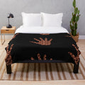 Soft, plush blanket with nature-inspired patterns and minimalist design
