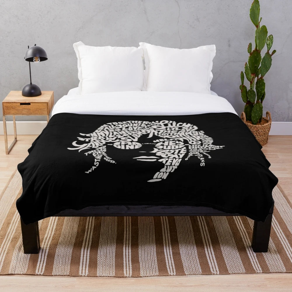 Plush blanket with a graphic portrait of the musician John Lennon