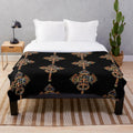 Plush blanket featuring an authentic African-inspired Ethiopian cross design