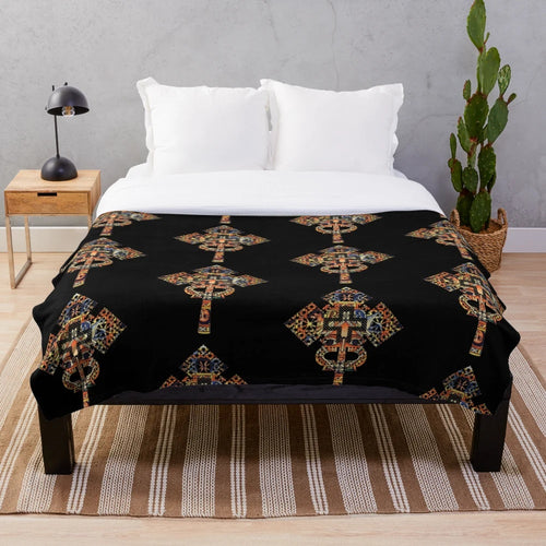 Plush blanket featuring an authentic African-inspired Ethiopian cross design