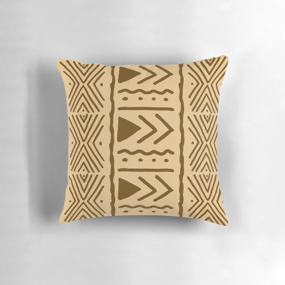 Tan and brown African Bogolan design throw pillow with tribal patterns for boho and safari-inspired home decor.