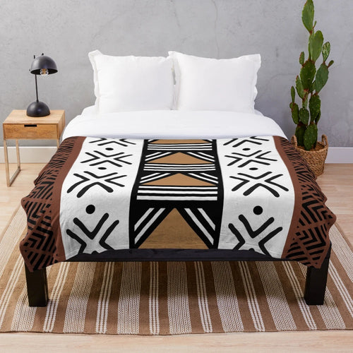 Soft, plush blanket with authentic African tribal bogolan pattern