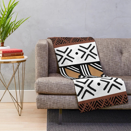 Soft, plush blanket with authentic African tribal bogolan pattern